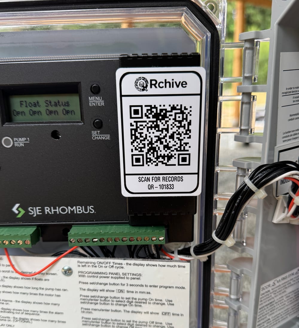 The QRchive sticker on the SJE Rhombus pump-control panel of the demo archive, QR-101833